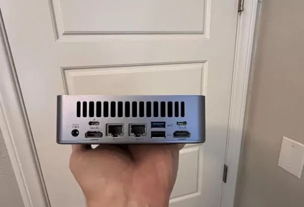 External view of the Geekom AX8 Max mini PC with a view of the rear ports